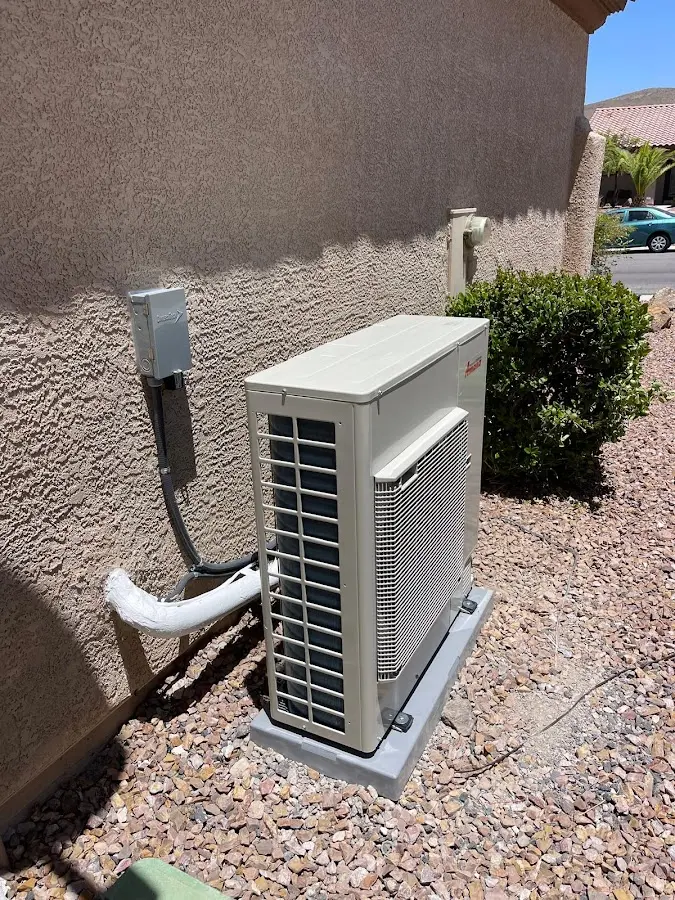 Residential air conditioning condenser unit in Fairbanks